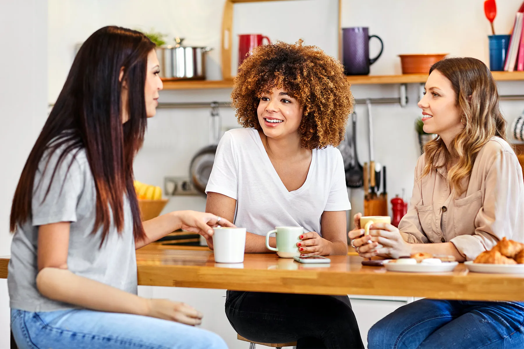 photo of friends having coffee at home